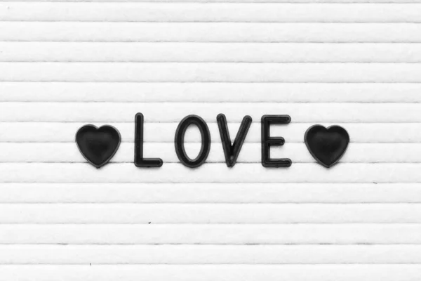 Black Color Letter Word Love White Felt Board Background — Stock Photo, Image