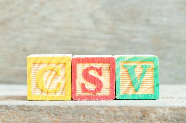 Kelime CSV ile renk alfabesi harfi bloğu (tahta arkaplan üzerinde Bilgisayar sistemi doğrulamasının kısaltılması veya virgülle ayrılmış değerler)