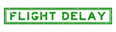 Grunge yeşil uçuş gecikmeli kelime kare lastik mühür beyaz arka planda