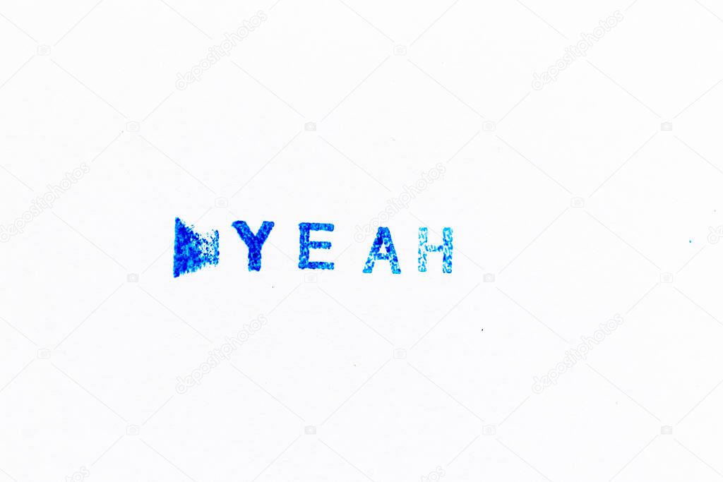 Blue color ink of rubber stamp in word yeah on white paper background