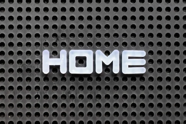 White Color Letter Word Home Black Pegboard Background — Stock Photo, Image
