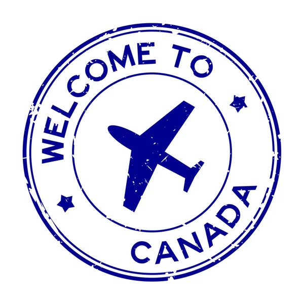 Grunge Blue Willkommen Kanada Wort Mit Flugzeug Symbol Runde Gummidichtung — Stockvektor