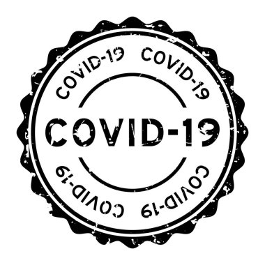 Grunge Covid-19 kelime yuvarlak lastik mühür beyaz arka planda
