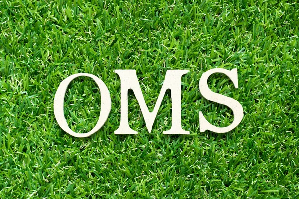 Alphabet letter in word OMS (Abbreviation of Order management system or Operations management system) on green grass background