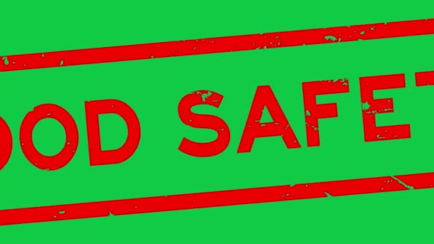 Grunge rouge mot de sécurité alimentaire carré cachet en caoutchouc zoom sur fond vert