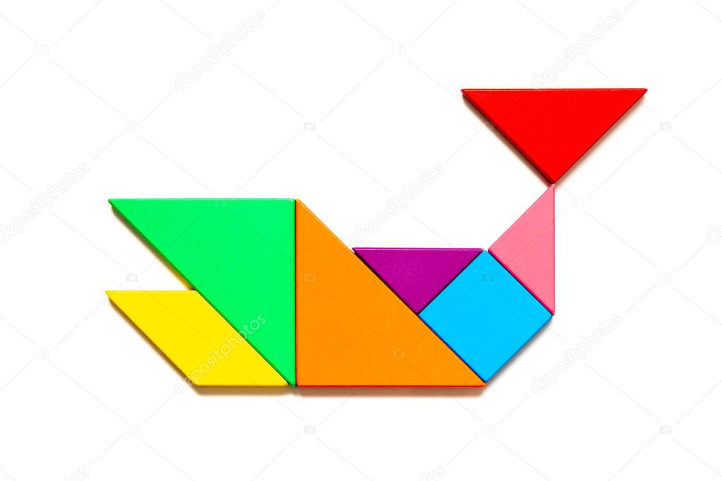 Color tangram puzzle in whale, fish or shark shape on white background