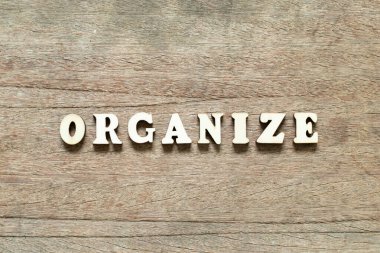 Alphabet letter block in word organize on wood background