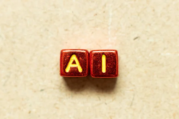 木材背景下Ai字 人工智能缩写 中的金属色字母块 — 图库照片
