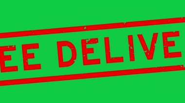 Grunge kırmızı ücretsiz teslimat sözcüğü kare kauçuk mühür yeşil arka planda yakınlaştırma