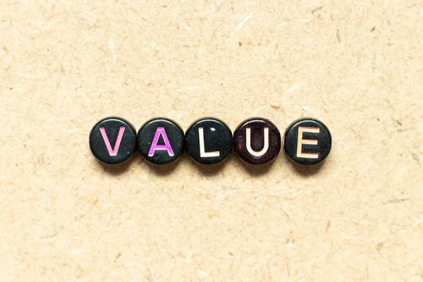 Black Color Bead Word Value Wood Background — Stock Photo, Image