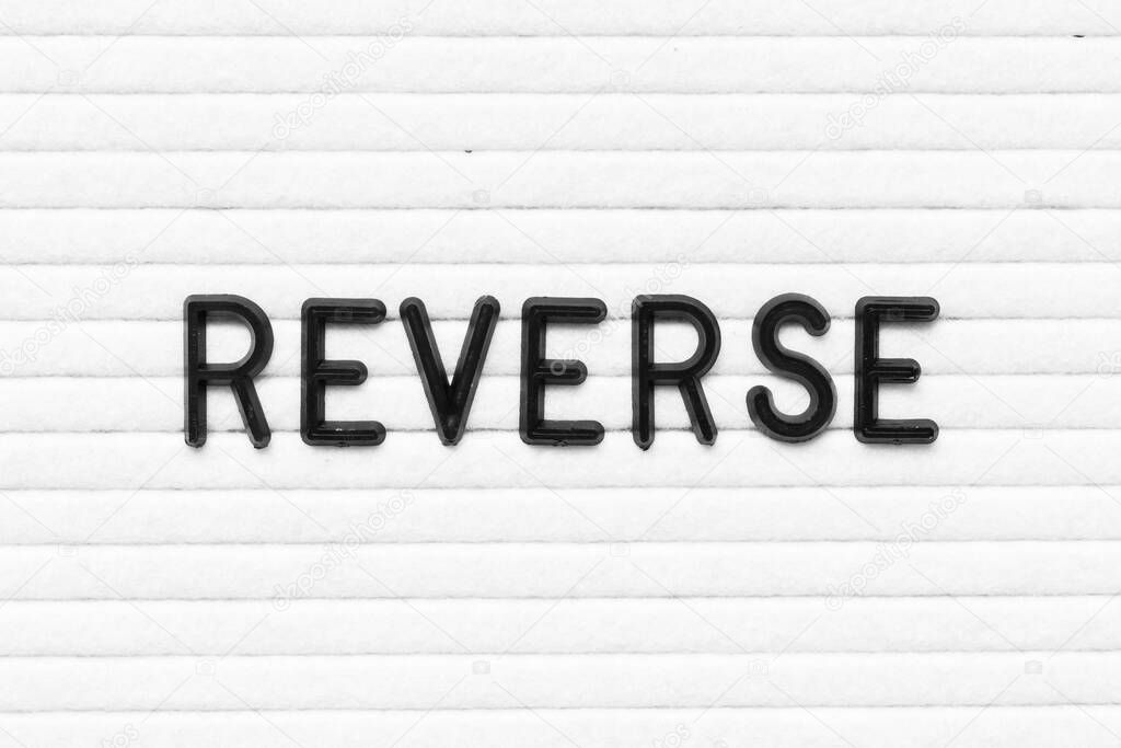 Black letter in word reverseon white felt board background