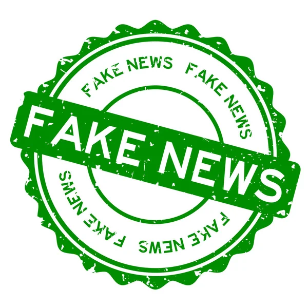 Grunge Zielony Fake News Słowo Okrągłe Gumowe Pieczęć Znaczek Białym — Wektor stockowy