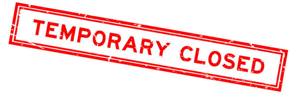 Grunge red temporary closed word rsquare ubber seal stamp on white background
