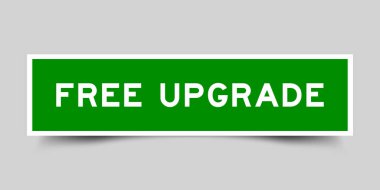 Gri arkaplanda kelime ücretsiz güncellemesi olan yeşil renkli kare biçimindeki etiket