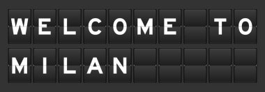Gri arka planda Milan 'a hoş geldiniz yazılı siyah renk analog kapak tahtası