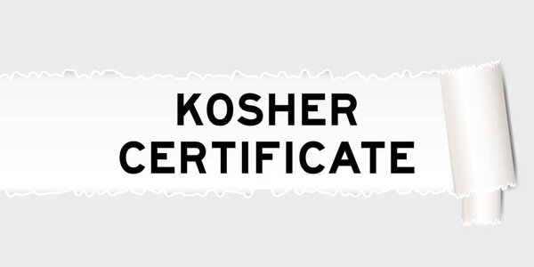 Ripped gray paper background that have word kosher certificate under torn part