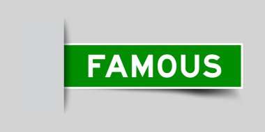 Gri arkaplana eklenmiş ünlü sözcüğüyle yeşil renkli kare biçimindeki etiket