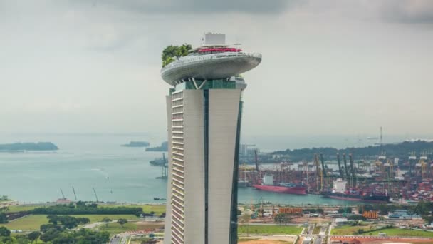 Дневной свет Singapore известный отель flyer залив 4k временной промежуток — стоковое видео