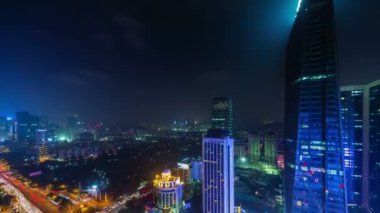 Çin shenzhen gece ışık şehir çatı üst panorama 4k zaman atlamalı