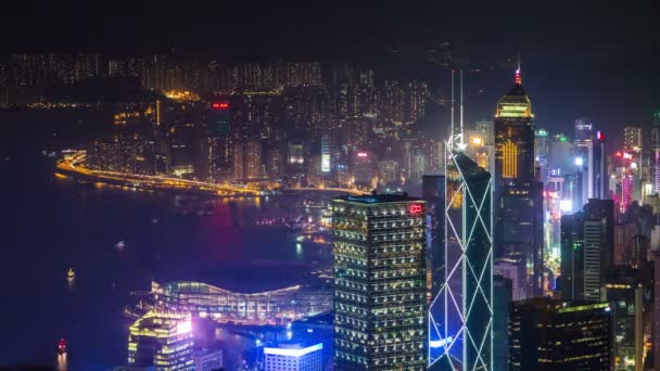 China noche luz puerto bahía Hong Kong ciudad rascacielos 4k time lapse — Vídeo de stock