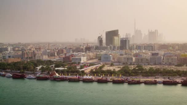 Dubai stad zonsondergang centrum deira dak top creek panorama 4 k tijd vervallen Verenigde Arabische Emiraten — Stockvideo