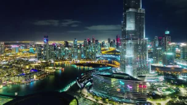 Iluminação noturna Dubai cidade mundo edifício mais alto até o topo 4k tempo lapso emirados árabes unidos — Vídeo de Stock