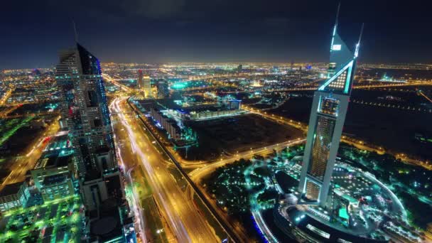Noční světlo Dubai downtown provoz pouliční střechu horní panorama 4 k time lapse Spojené arabské emiráty — Stock video