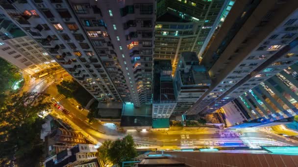 China hong kong night light traffic street down from roof top 4k time lapse — Stock Video