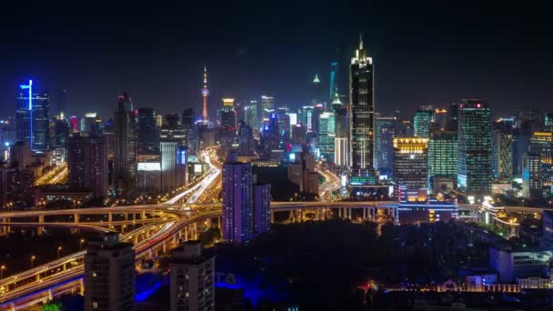 Nachtlampje shanghai uitwisseling en gebouwen panorama 4k time-lapse — Stockvideo