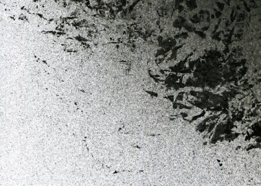 Soyut grafiti arkaplanı. Hava fırçası efektli duvar kâğıdı. Beyaz kağıda siyah akrilik boya dokusu. Dağınık çamur sanatı. Makro sprey boya. El yapımı grunge arka plan