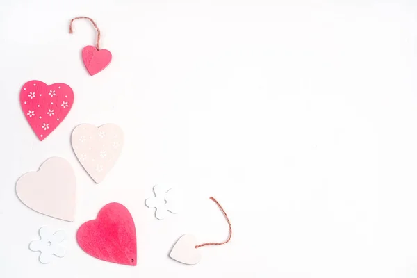 Pink and white hearts on a light background. — Stock Photo, Image