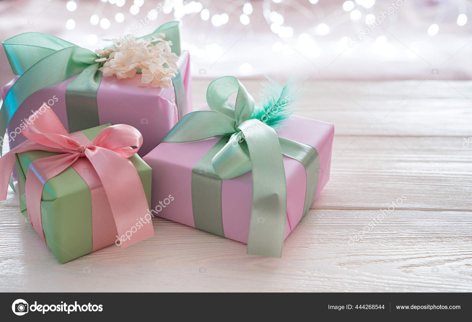 Pink ribbon for gift wrapping on a solid pink background Stock Photo