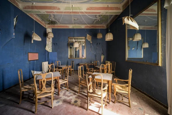 dining room with chairs and table in old abandoned house, high quality