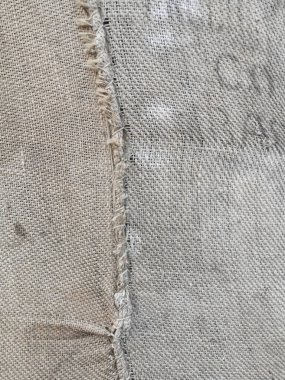 Dikiş arkaplanı olan tuval kılıfının detaylı dokusu. Yüksek kalite fotoğraf