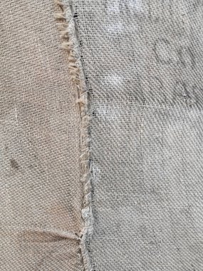 Dikiş arkaplanı olan tuval kılıfının detaylı dokusu. Yüksek kalite fotoğraf