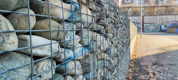 river rock walls in metal cages. High quality photo