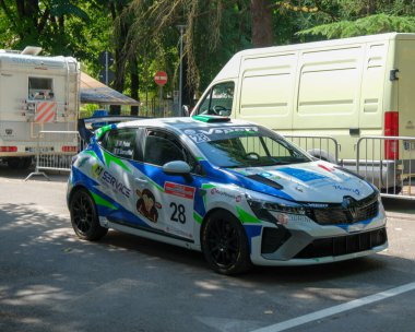 Salsomaggiore Terma Parma, Italy : 2025 08 03 A white and grey camouflage-liveried Renault Clio rally car . High quality photo
