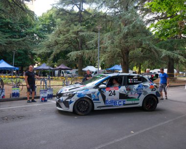 Salsomaggiore Terma Parma, Italy : 2025 08 03 A white and grey camouflage-liveried Renault Clio rally car . High quality photo