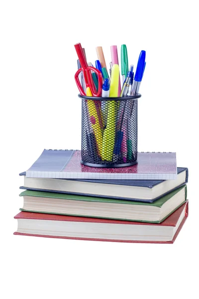Книги и ноутбуки с ручками в банке — стоковое фото