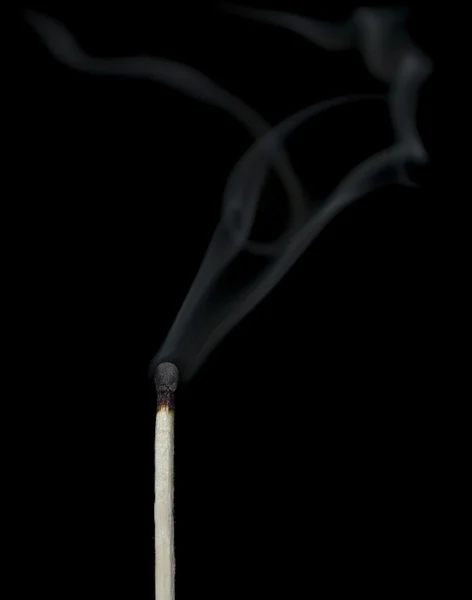 Ignition of a match, with smoke on dark background — Stock Photo, Image