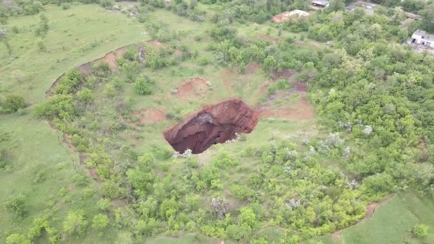 Big hole in the ground mine collapse — Stock Video