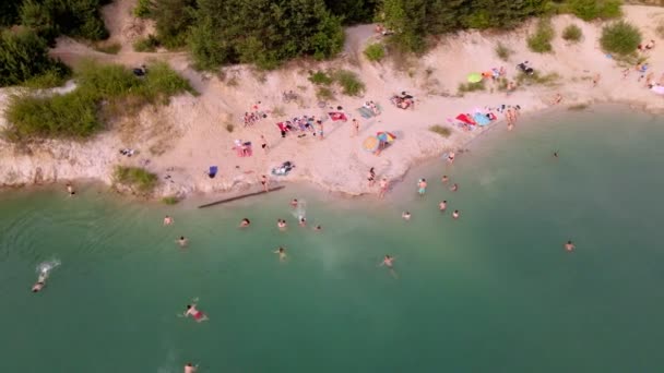 Aerial view of sand beach at lake with blue water — Stock Video