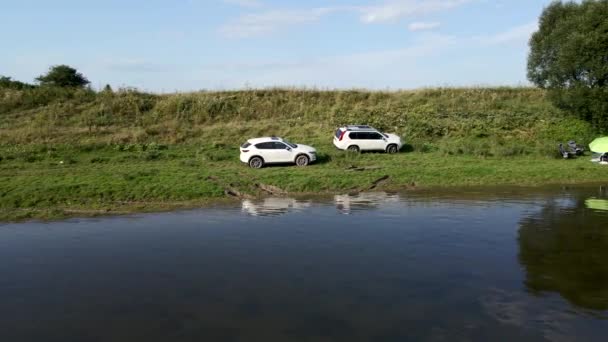 People resting at river beach summertime — Stock Video