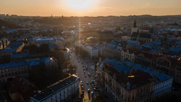 aerial view of sunset above old european city copy space