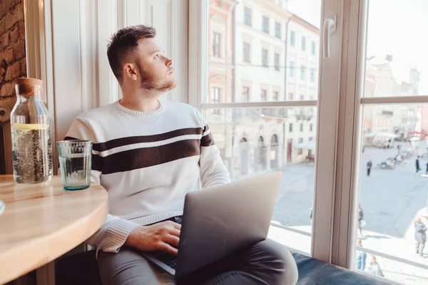 Man Working Laptop Cafe Big Window Copy Space Remotely Work — Stock Photo, Image