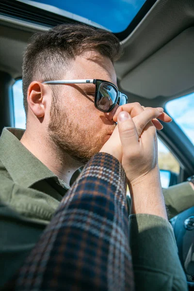 man driver kissing hand of the woman couple