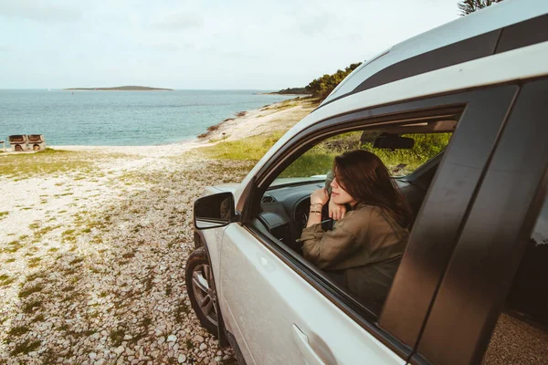 woman get travel destination by car summer sea beach. vacation concept