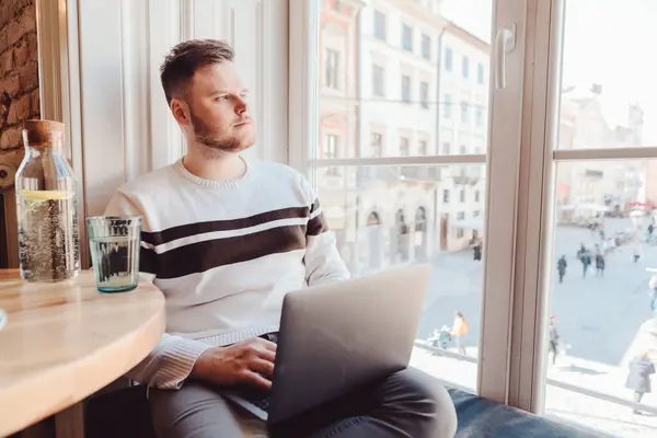 Man Working Laptop Cafe Big Window Copy Space Remotely Work — Stock Photo, Image