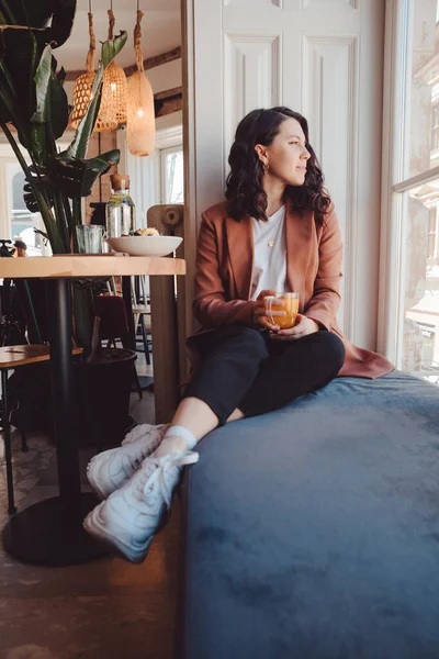 Smiling Woman Sitting Cafe Drinking Tea Looking Window Copy Space — Stock Photo, Image