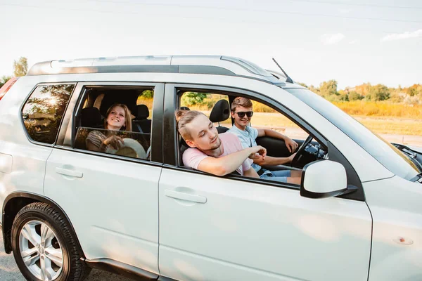 Friends Car Looking Window Road Trip Concept — Stock Photo, Image